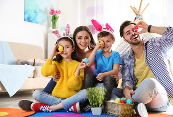 Happy family spending time together during Easter holiday at home
