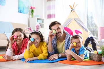 Happy family spending time together during Easter holiday at home