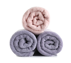 Fresh soft rolled towels isolated on white