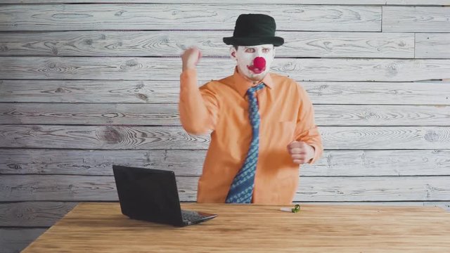 Clown businessman working in the office