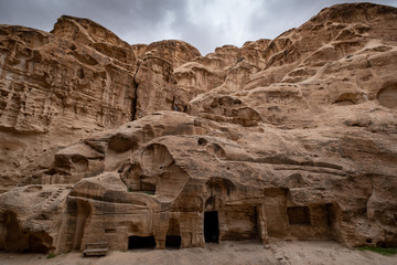 Stone carved temples in Little Petra in Jordan