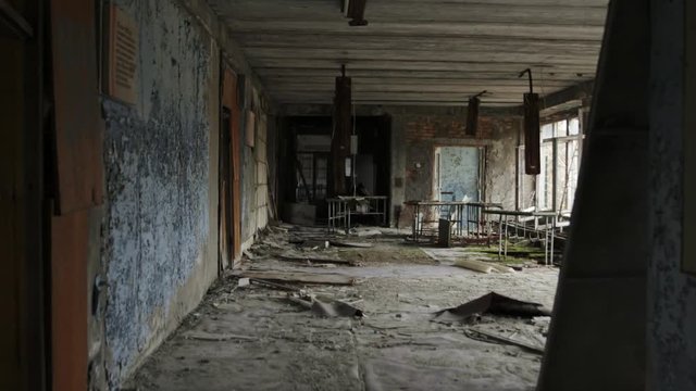 Abandoned corridor of some forsaken building glide footage