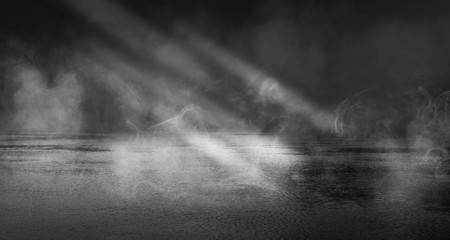 Background scene of empty street. Night view of the river, the night sky with clouds, the...