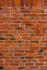 Closeup photo of red wooden wall background on street