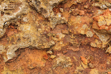  Rock, layeres structure, warm brown, yellow, red shades.