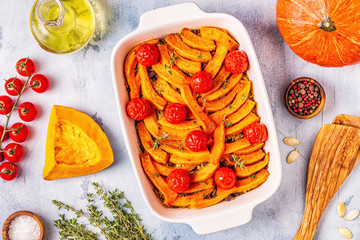 Pumpkin casserole with meat, rice, tomatoes.