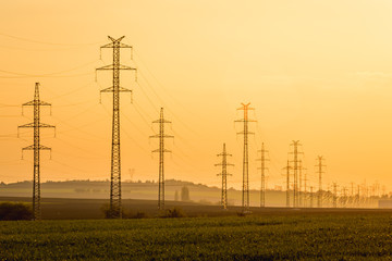 High voltage post tower sky sunset background