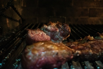 Typical argentine asado (grill): pork meat on a grill