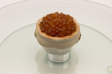 Luxury Red Caviar in the vase. Food photo concept.