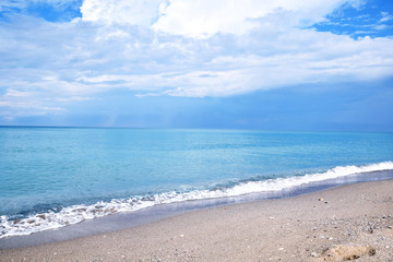 Fototapeta na wymiar Seascape Beach Covered with Seashells Shore Colorful Scenic Landscape Background Wallpaper Stock Photo