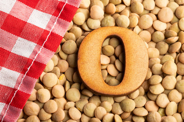 Letter O, Lentils with checkered napkin - Top view