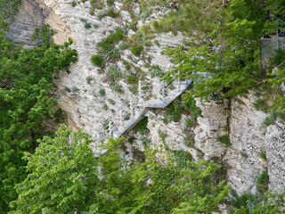 Ladder for descent on a cliff of limestone.