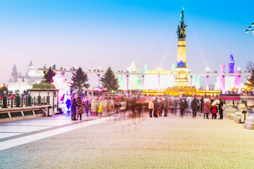 Fototapeta premium Flood control monument, tourists are visiting. The text on monument translation into english is Harbin people's flood control victory monument. Located in Harbin, Heilongjiang, China.