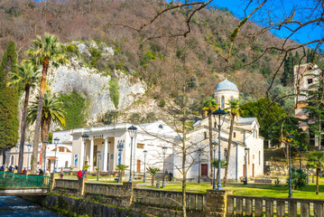 Fototapeta na wymiar The temple of St. Simon the Cananite and the building of the museum of the Abkhaz kingdom in New Athos in Abkhazia
