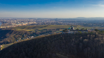 Beautiful drone shot of Leopoldsberg near Vienna with the city in the background