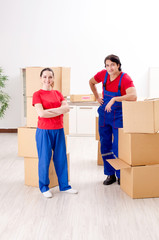 Fototapeta na wymiar Professional movers doing home relocation 