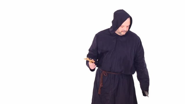 man in hoodie choosing - Christan cross & knife simbols in hands - white screen background
