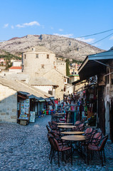  Mostar old town street with shops and historic architecture. Bosnia and Herzegovina