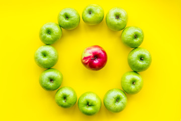 summer food with apples on yellow background top view pattern