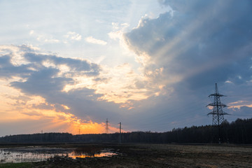 Obraz premium sunset over the field