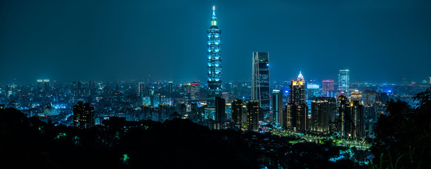 Beautiful Taipei skyline at night.  Taipei 101 skyscraper featured.  Taiwan