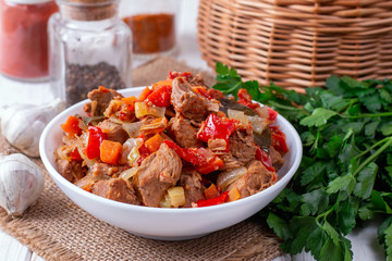 Stewed vegetables in a white bowl