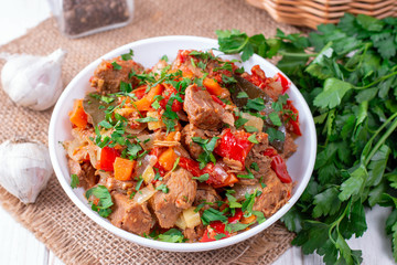 Stewed vegetables in a white bowl