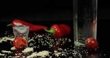 Man takes a glass filled with vodka, drinks it and put empty glass back
