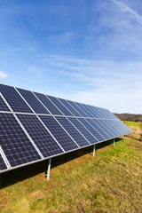 Solar Power Station on the early spring Meadow 