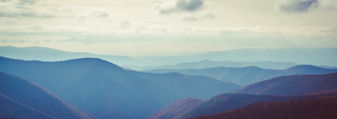 Spring mountains in cloudly day