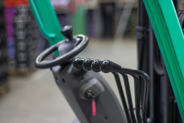 steering and cab of forklift with levers. in stock