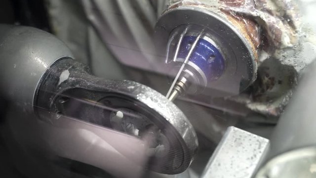 Closeup view at carving process in dental milling machine