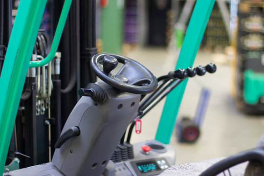 steering and cab of forklift with levers. in stock
