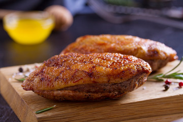 Duck breast, lavender honey and rosemary, served on chopping board