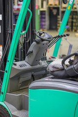 steering and cab of forklift with levers. in stock