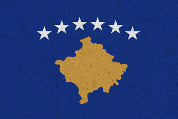 Kosovo flag on concrete wall