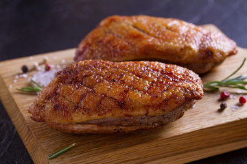 Duck breast, lavender honey and rosemary, served on chopping board