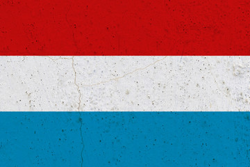 luxembourg flag on concrete wall