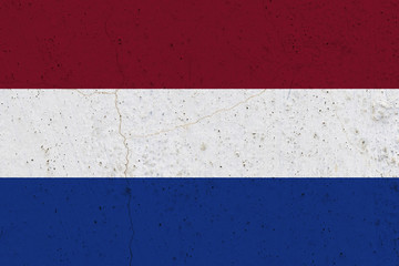 netherlands flag on concrete wall