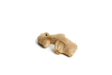 Ginger root on a white background. Isolated ginger whole. Help in treatment. The concept of using ginger for coffee, tea. A strong taste of ginger added to the dishes.