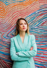 Young woman in Blazer of 90s style