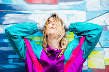 Young woman in jacket of 90s style