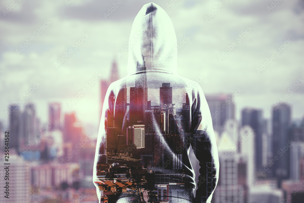 Poster hacker on city background