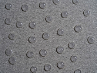 Water drops on square pattern monochrome background