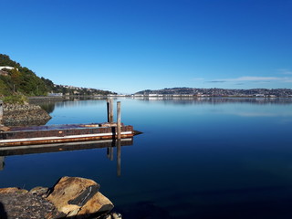 Old Jetty Relection over still Harbour