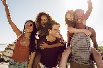Group of young friends having fun outdoors