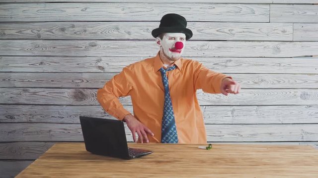 Clown businessman working in the office