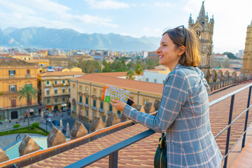 happy tourist girl taking selfie with panorama of Palermo, Sicily, Italy