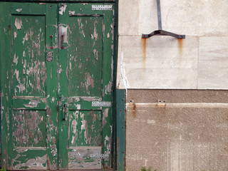 Old wooden door on old building