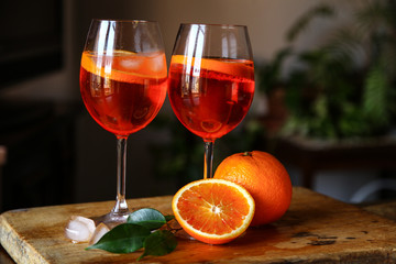 Aperol spritz cocktail in glass on wooden table